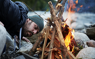 Potential Opdualag patient building a campfire.